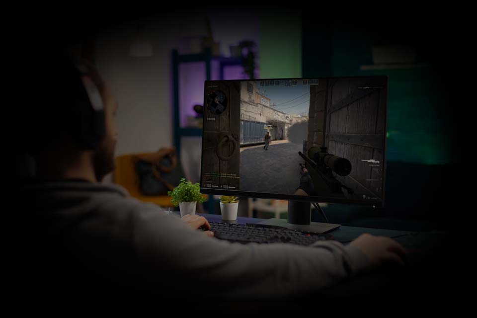 A tournament participant playing CSGO on PC